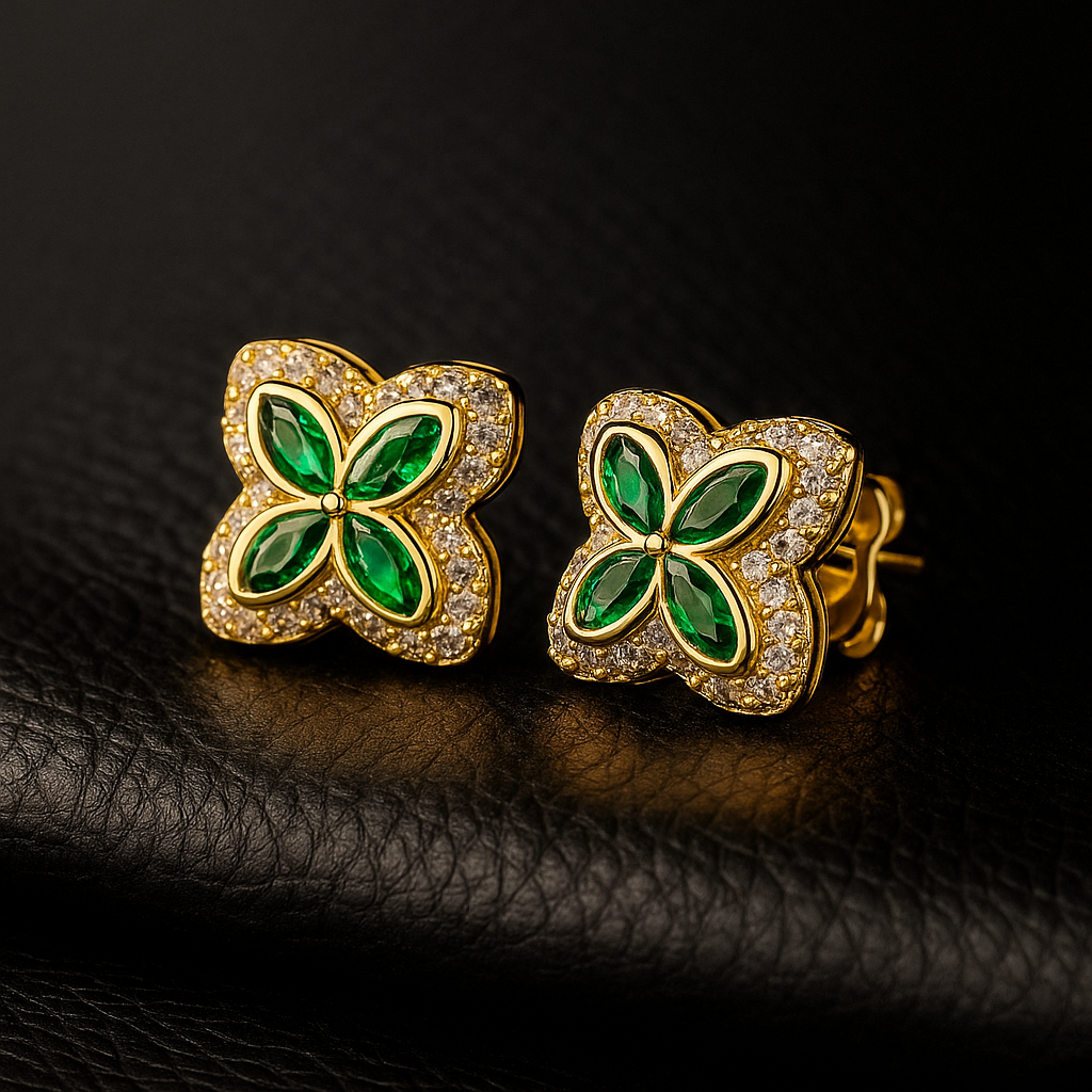 Four Leaf Clover‑shaped earrings covered in small sparkling stones.