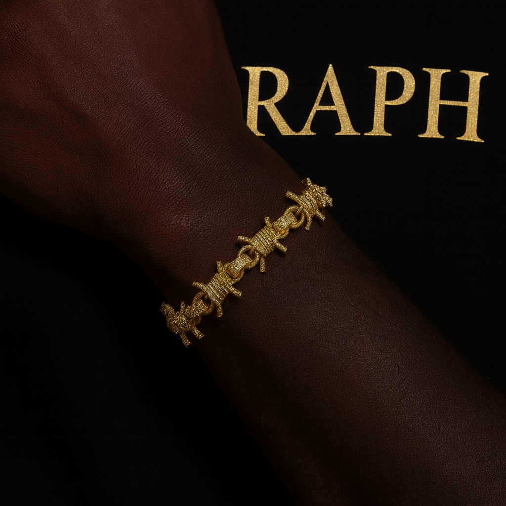 Bracelet styled like barbed wire, encrusted with sparkling stones and gold plated.